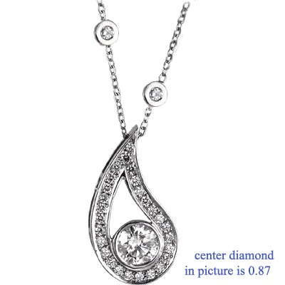 Drop pendant with surrounding diamonds