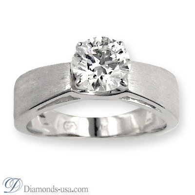Wide band solitaire diamond engagement ring