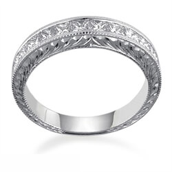 Picture of Hand engraved Princess diamonds wedding band.