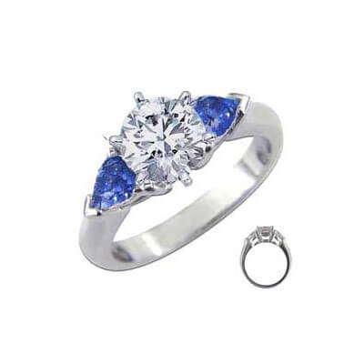 Engagement ring with side Sapphires Pear Shapes