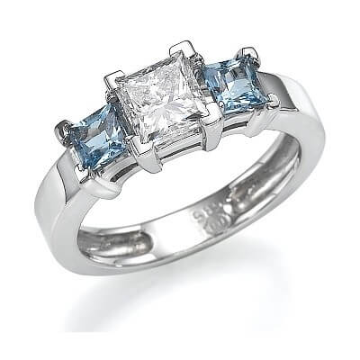 Two aquamarine side stones engagement ring