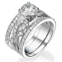 Vintage designers bridal trio, 0.61ct side diamonds