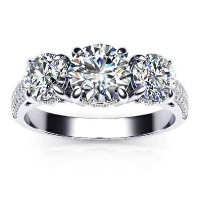 Three stones diamond ring encrusted with diamonds and two 0.40 carat round diamonds G VS