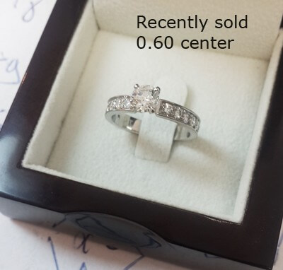 0.65 carat side diamonds engagement ring 