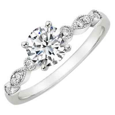 Scalloped low profile engagement ring with 0.10 carat diamonds