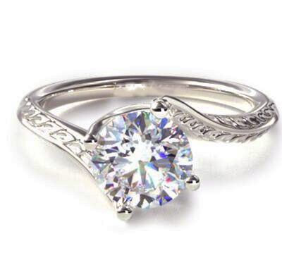 Vintage style wheet motif solitaire engagement ring