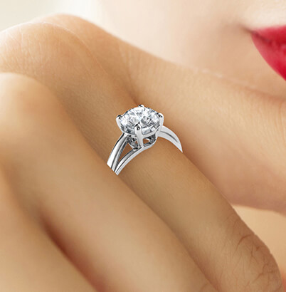 Solitaire cathedral engagement ring with a twist, Margaret