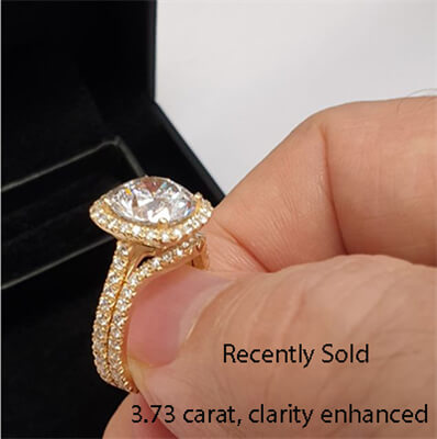 Halo engagement ring for larger diamonds