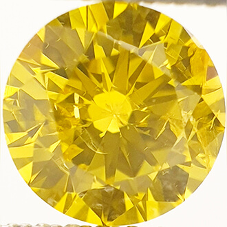 Picture of 0.90 carat, Round diamond, Fancy vivid yellow , color enhanced, SI1 clarity