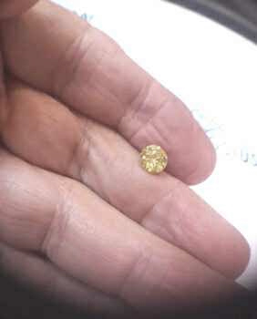 Picture of 1.40 Carats, Round Diamond with Very Good Cut Fancy Vivid Yellow, SI2,color & clarity enhanced, By EGS/EGL