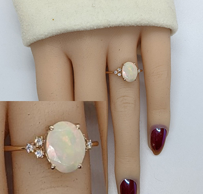 1.50 carat Opal engagement ring with diamonds