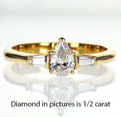 Cathedral Engagement ring  with two tapered Baguette diamonds 0.24 carat