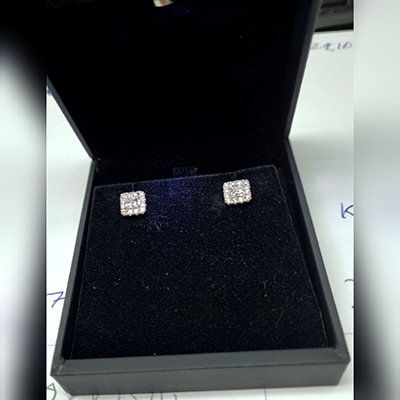 Pair of Princess diamond earrings 1.10 carat TW