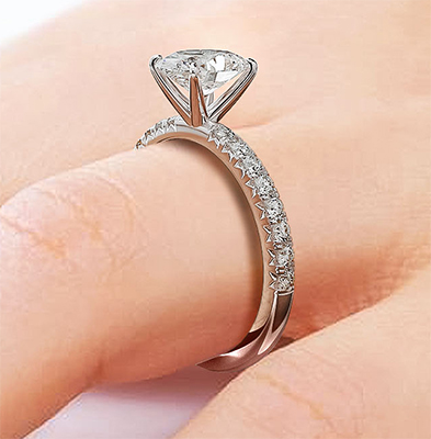 Oval engagement ring with side diamonds