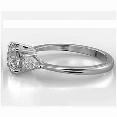 Three stone diamond engagement ring with 0.20 CTW side Pear diamonds