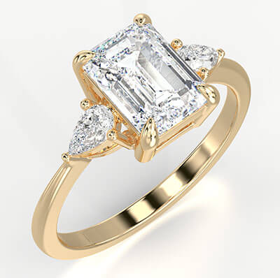 Three stone engagement ring with 0.20CTW side Pear diamonds